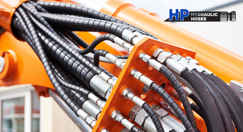 Technician assembling a high-pressure hydraulic hose for mining equipment in Sydney